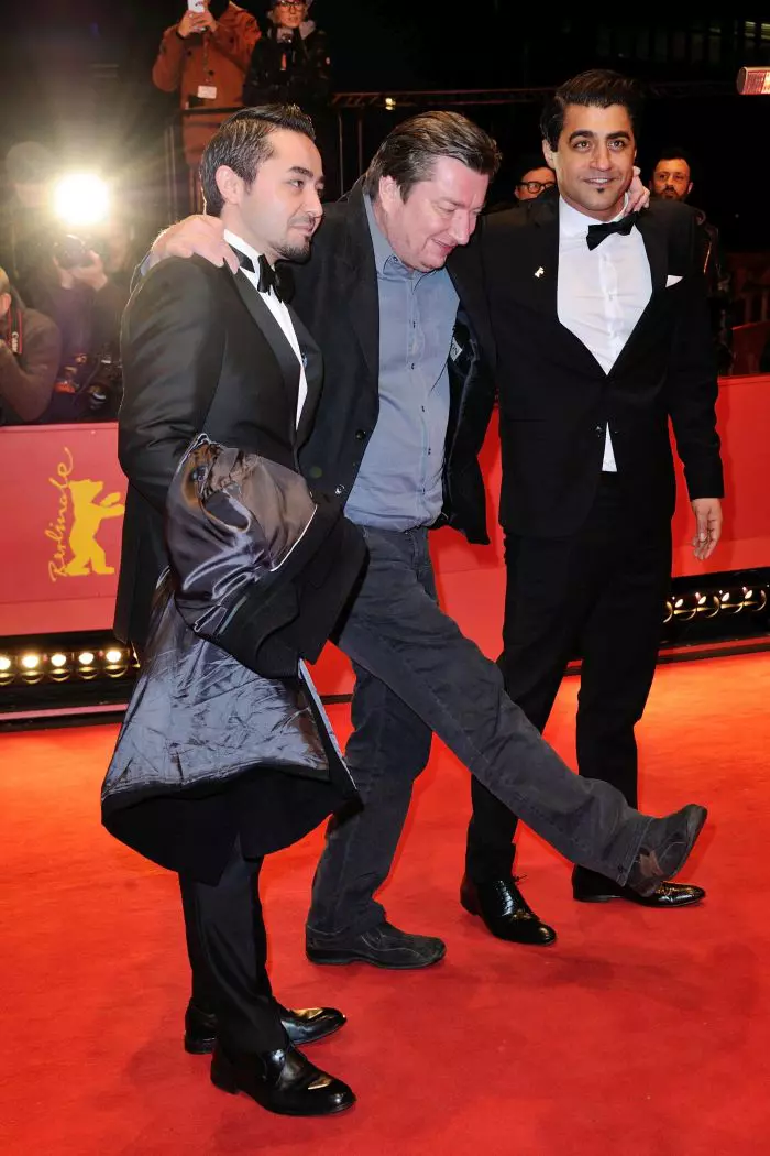 Actor Sherwan Haji, director Aki Kaurismaki and actor Simon Hussein Al-Bazoon