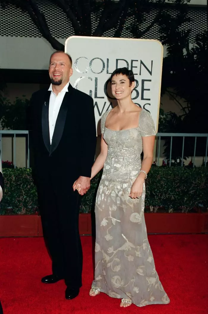 Bruce Willis și Demi Moore, în 1997