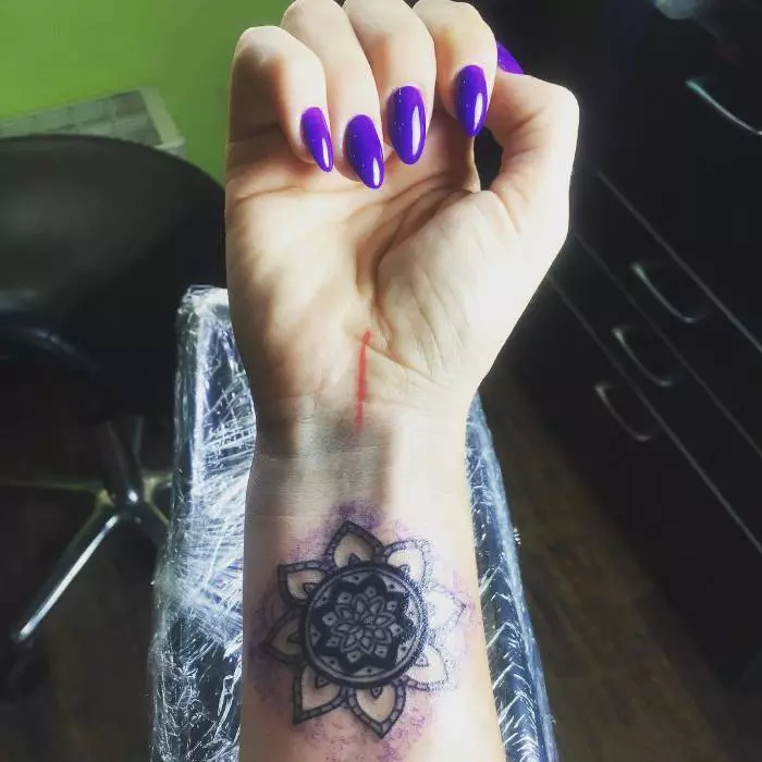 Delia are multe tatuaje