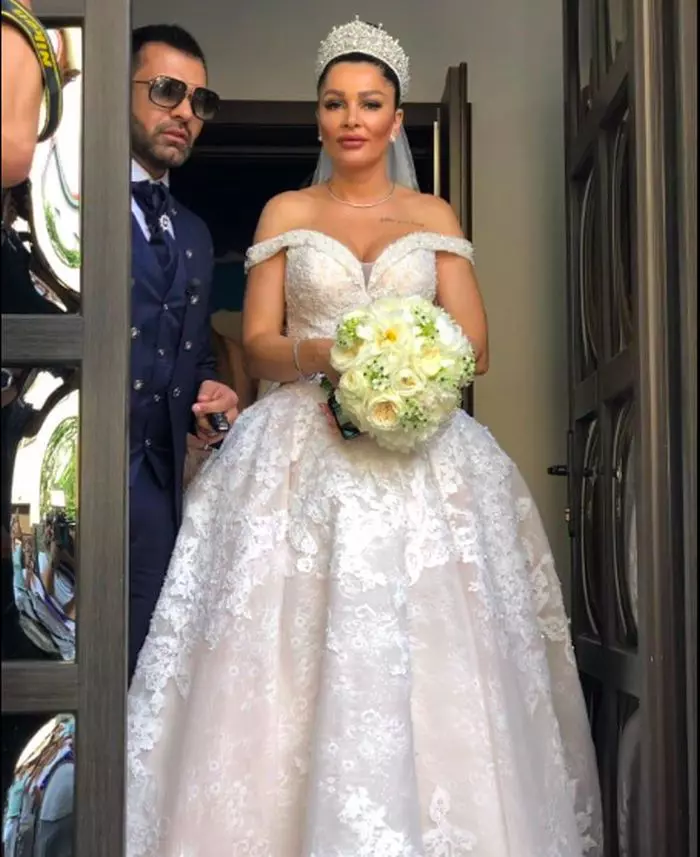 Brigitte și Florin, în ziua nunții lor. Mireasa a purtat o rochie în valoare de 10.000 de euro!