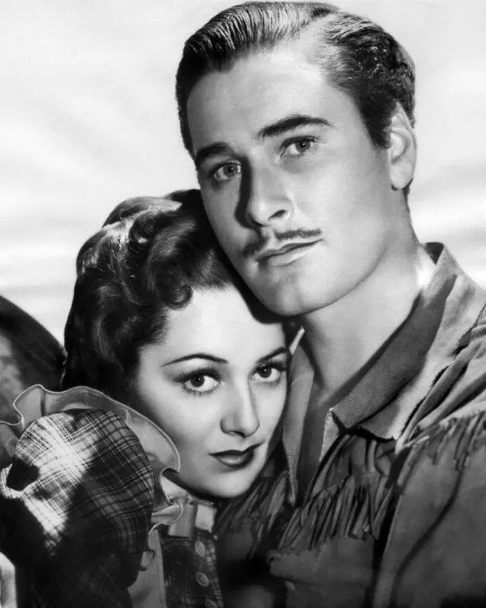 Olivia de Havilland și Errol Flynn în „Dodge City” (1939)