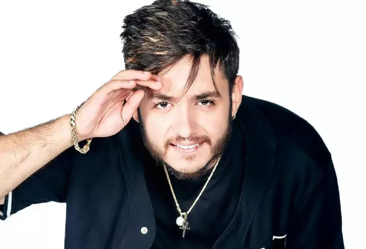 Cine este părintele Calistrat Chifan. Preotul filmat când lovește o femeie a mai fost cercetat pentru comportament violent