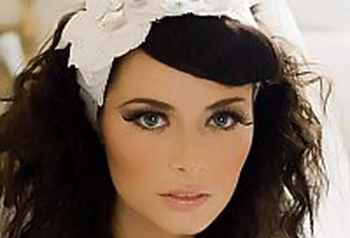 Kylie Minogue a fost decorata de Printul Charles