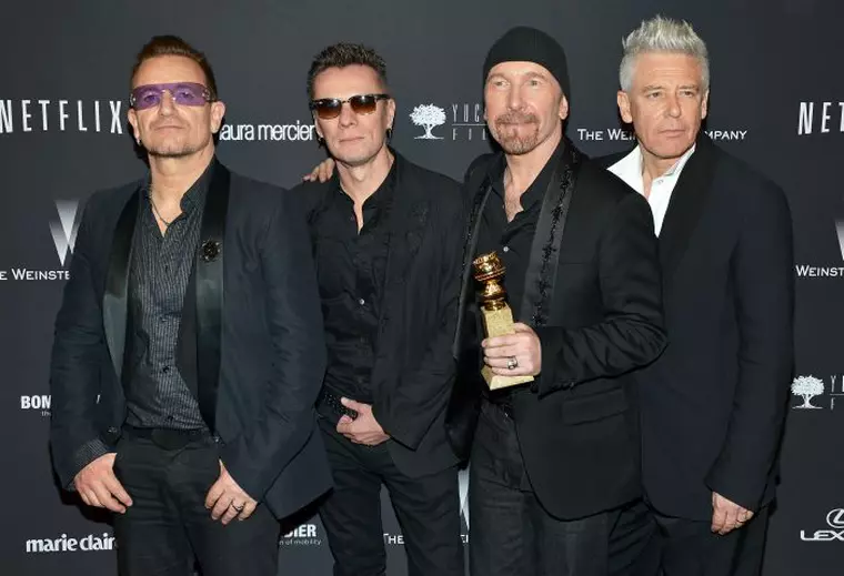 (L-R) U2's Bono, Larry Mullen Jr., The Edge and Adam Clayton arrive at the Weinstein Company and Netflix Golden Globes after party in Los Angeles, California on January 12, 2014.  UPI/Christine Chew / eyevine Contact eyevine for more information about using this image: T: +44 (0) 20 8709 8709 E: info@eyevine.com http://www.eyevine.com *** Local Caption *** 01223580