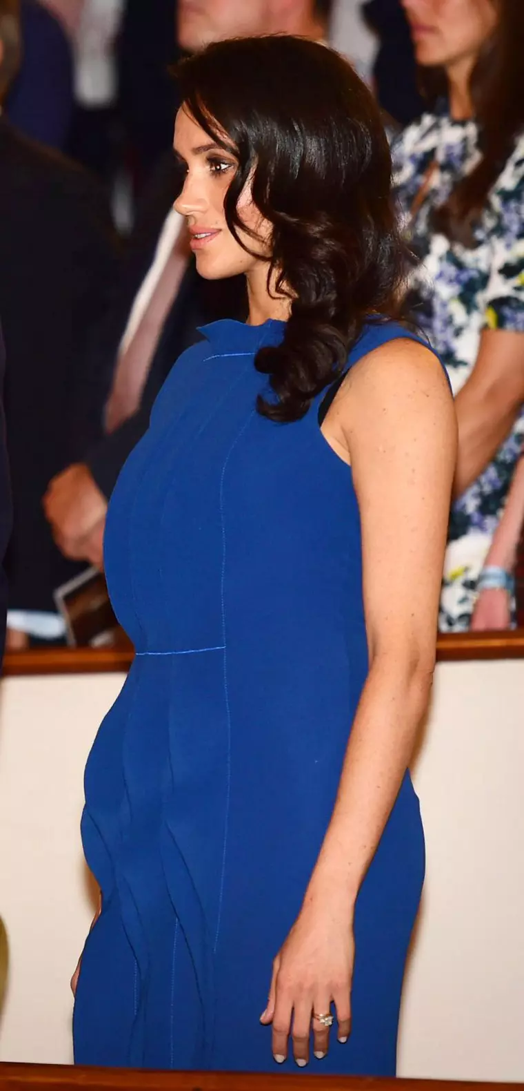 În această imagine, Meghan Markle chiar pare însărcinată...