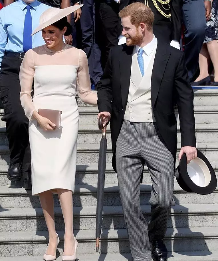 15. Meghan Markle și Prințul Harry la petrecerea organizată în grădina de la Palatul Buckingham cu ocazia sărbătoririi zilei de naștere a Prințului Charles