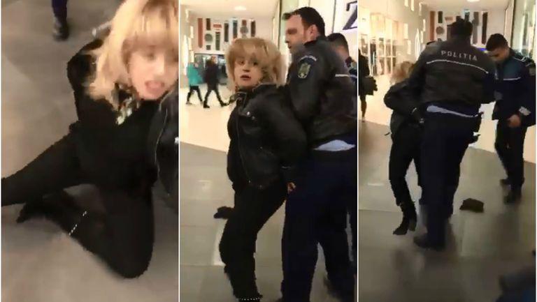 Mama luata pe sus de politisti, in fata copilului sau, intr-un mall din Bucuresti