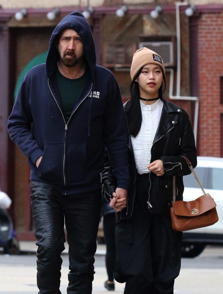 Nicolas Cage and his girlfriend matching black leather ...