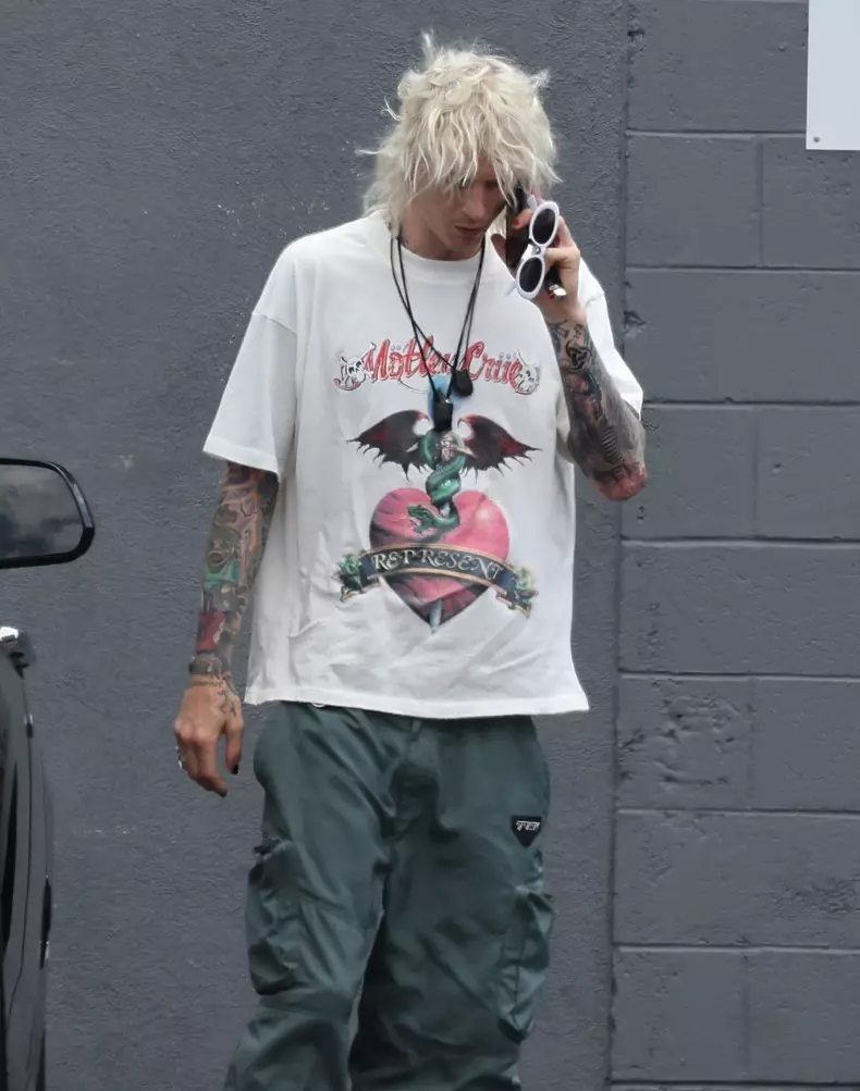 *EXCLUSIVE* Machine Gun Kelly looks tense on a phone call as ‘ride or die’ Meghan Fox remains absent from the rocker's side