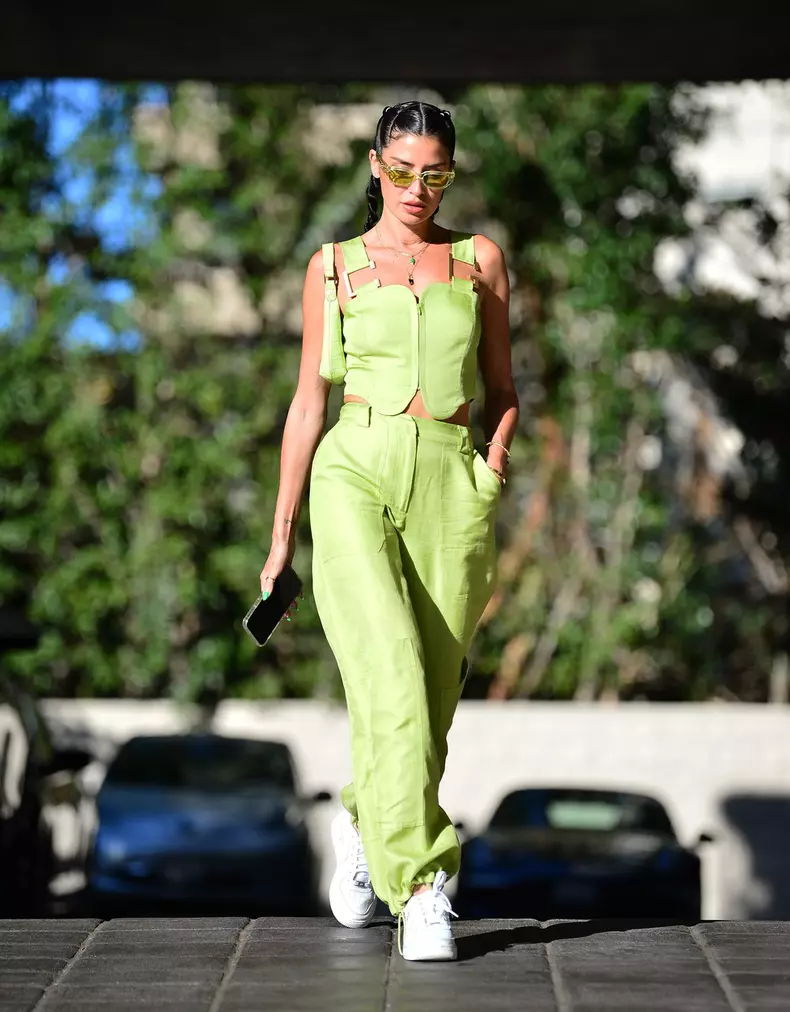 EXCLUSIVE: Nicole Williams English Heads Out To Dinner In Striking Fluorescent Green Overall Set in LA.