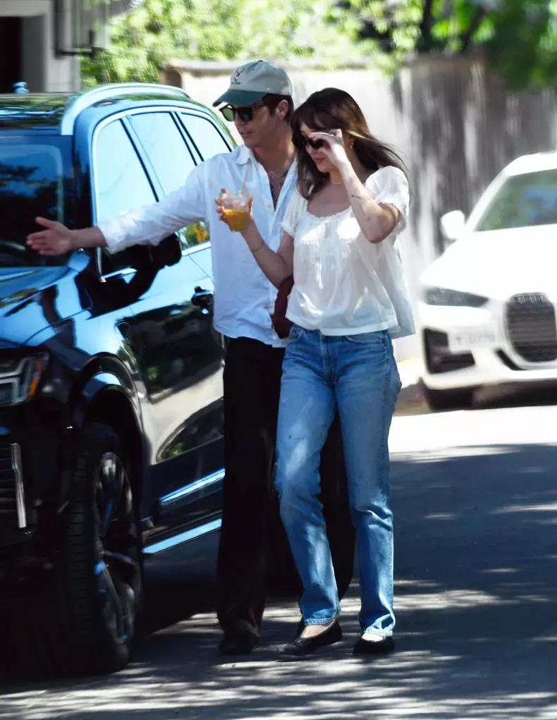 EXCLUSIVE: Dakota Johnson and Role Model Keep Close on Easter Sunday in Los Angeles