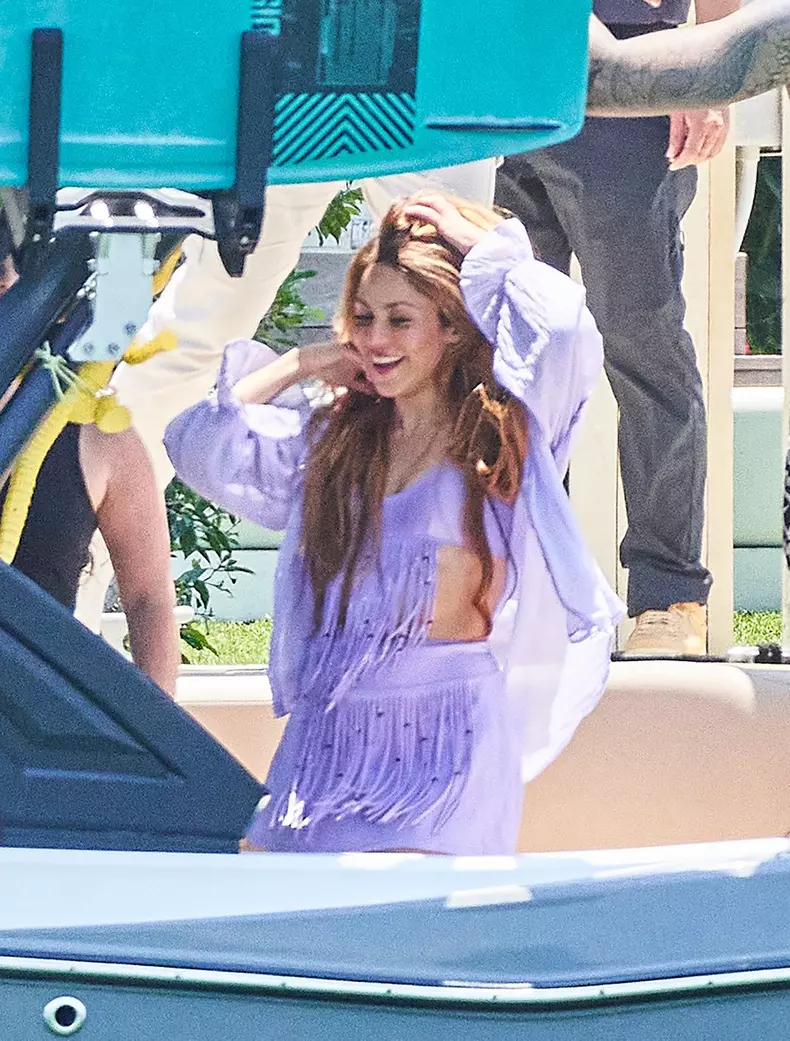 Shakira enjoys a barefoot trip with a boatload of male pals including F1 star Lewis Hamilton Miami as rumors swirl over possible Tom Cruise romance.