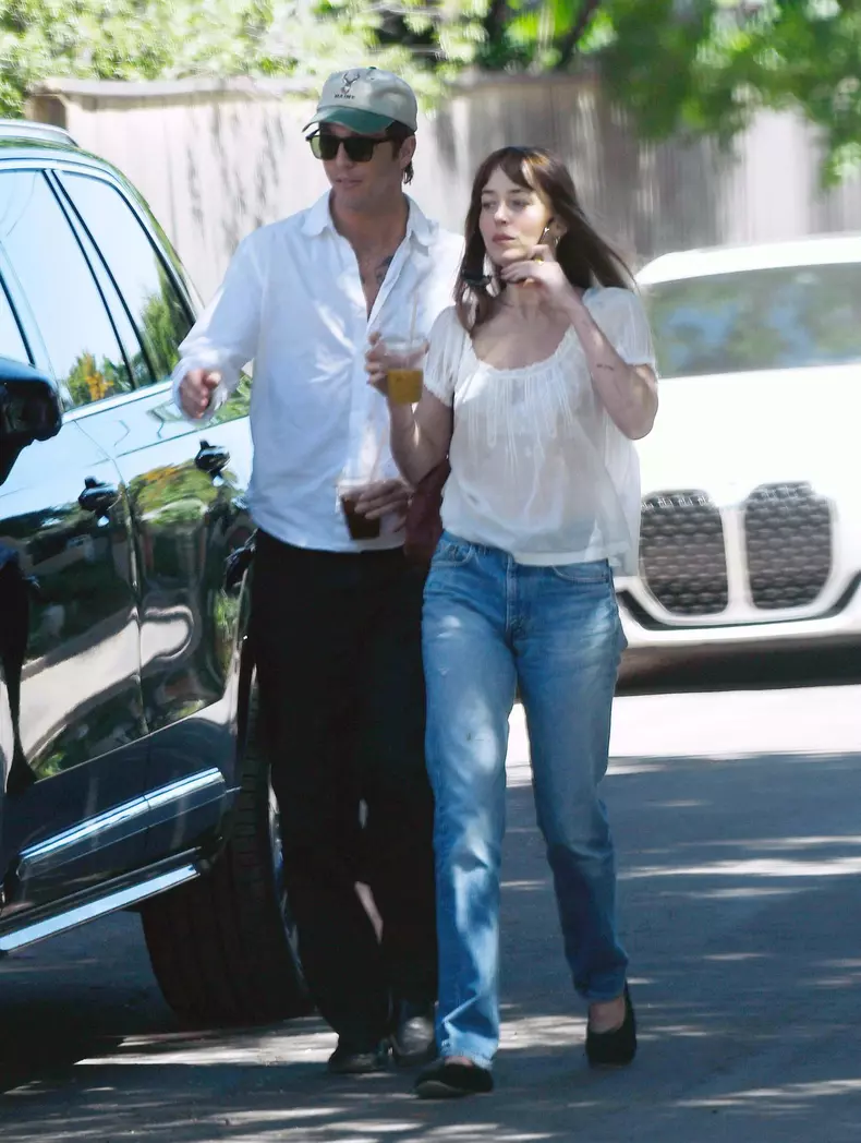 EXCLUSIVE: Dakota Johnson and Role Model Keep Close on Easter Sunday in Los Angeles