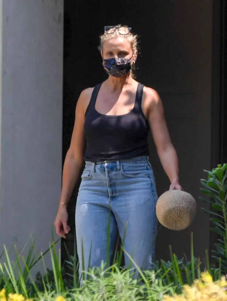 EXCLUSIVE: Cameron Diaz and Benji Madden leave a showing of a home worth $13,980,000