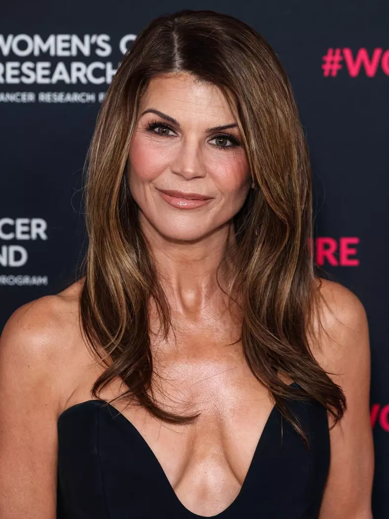BEVERLY HILLS, LOS ANGELES, CALIFORNIA, USA - MARCH 11: Lori Loughlin arrives at The Women's Cancer Research Fund's An Unforgettable Evening Benefit Gala 2026 held at the Beverly Wilshire, A Four Seasons Hotel on March 11, 2026 in Beverly Hills, Los Angel