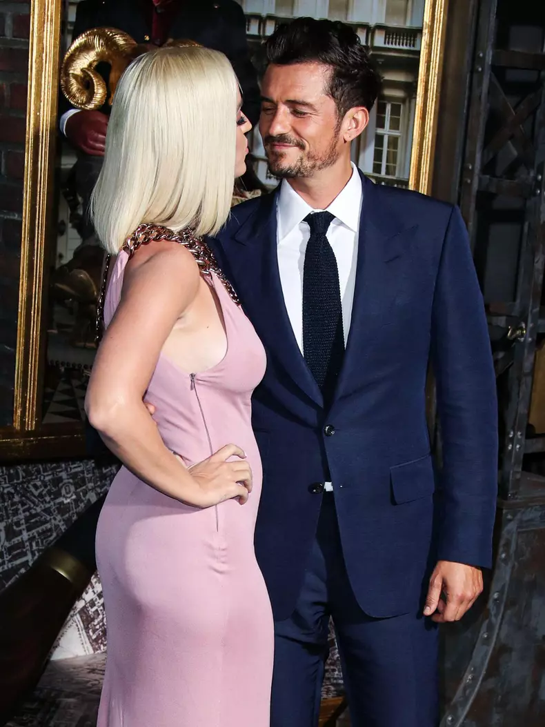 (FILE) Katy Perry Receives Backlash After Blue Origin Space Flight. HOLLYWOOD, LOS ANGELES, CALIFORNIA, USA - AUGUST 21: Singer Katy Perry and fiance/actor Orlando Bloom arrive at the Los Angeles Premiere Of Amazon's 'Carnival Row' held at the TCL Chinese