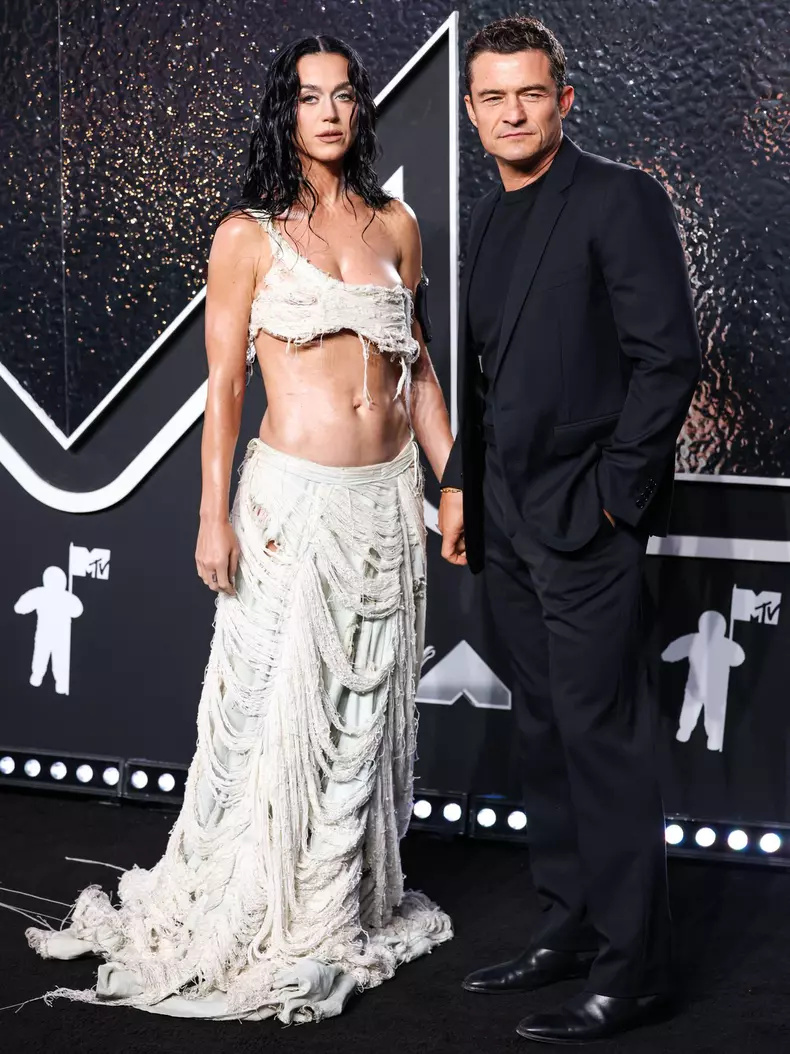(FILE) Katy Perry Receives Backlash After Blue Origin Space Flight. ELMONT, NEW YORK, USA - SEPTEMBER 11: American singer, songwriter, and TV personality Katy Perry wearing Who Decides War and husband Orlando Bloom arrive at the 2024 MTV Video Music Award