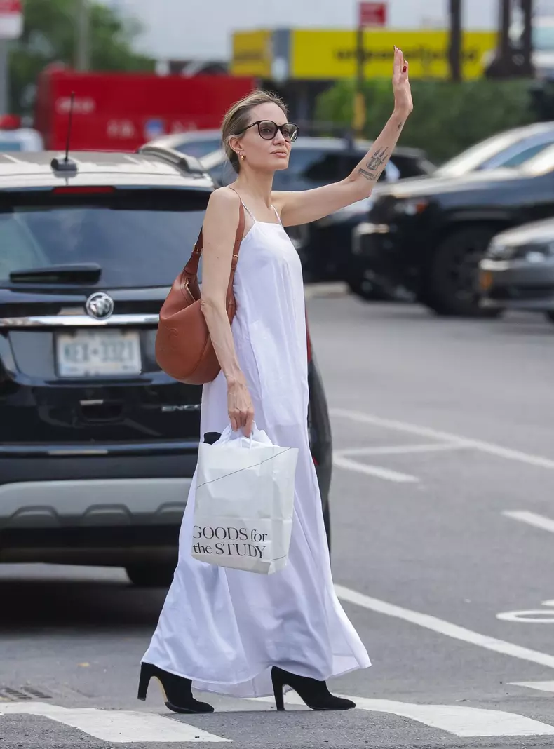 EXCLUSIVE: Angelina Jolie Strikes a Classic Pose While Hailing a Cab in New York City
