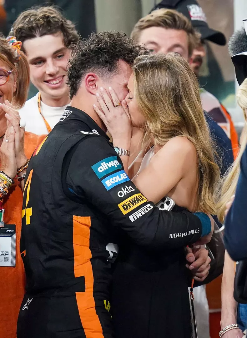 Yas Island, United Arab Emirates. 07th Dec, 2025. Lando Norris 4 (GBR), McLaren MCL39 kisses his girlfriend Magui Corceiro after winning the World Drivers' Championship . Race Day at the Formula One Etihad Airways Abu Dhabi Grand Prix 2025 at the Yas Mari