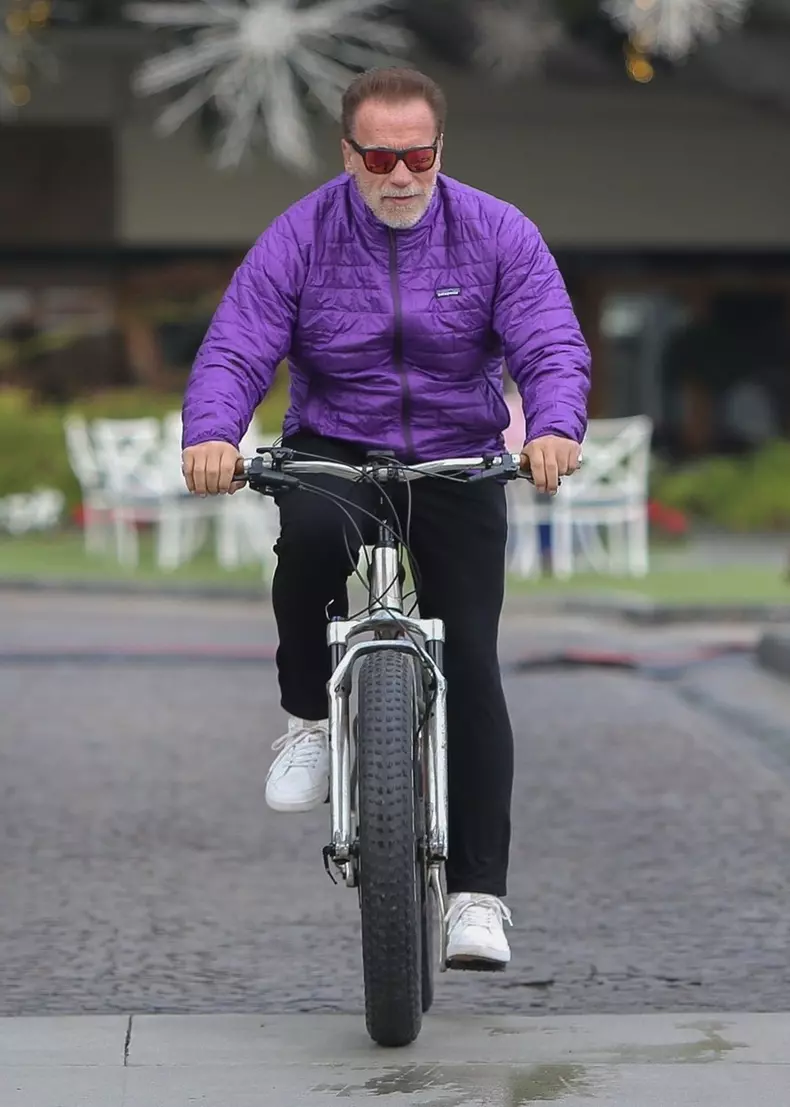 *EXCLUSIVE* Arnold Schwarzenegger goes for his daily bike ride with a buddy