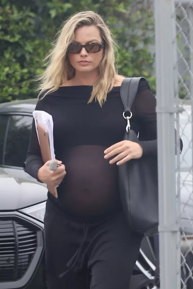 *EXCLUSIVE* Margot Robbie was spotted with her husband in Brentwood, stylishly showing off her baby bump!