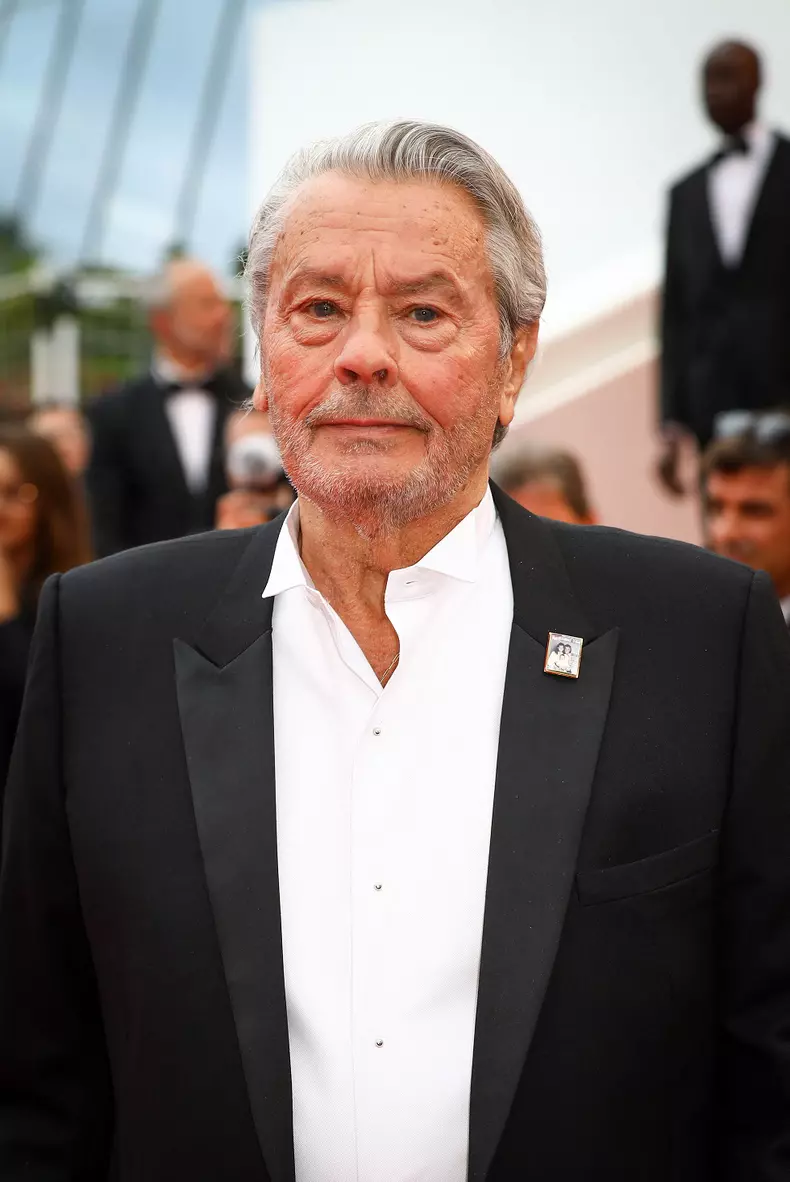 Cannes - Alain Delon Walks The Red Carpet