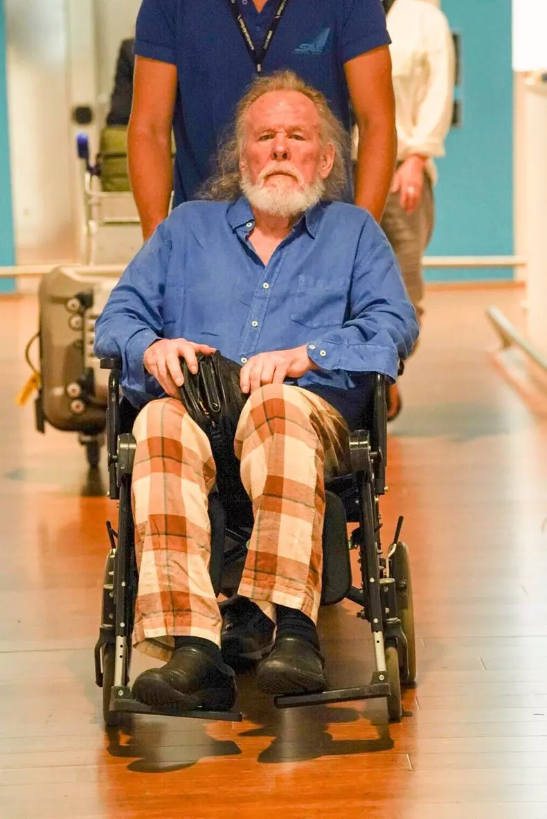 Nick Nolte arrives at the airport in a wheelchair ahead of the 83rd Venice International Film Festival
