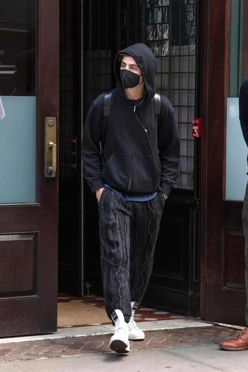 Timothee Chalamet makes a fast exit from his New York hotel on his way to the airport amid  rumors of a romance with Kylie Jenner.