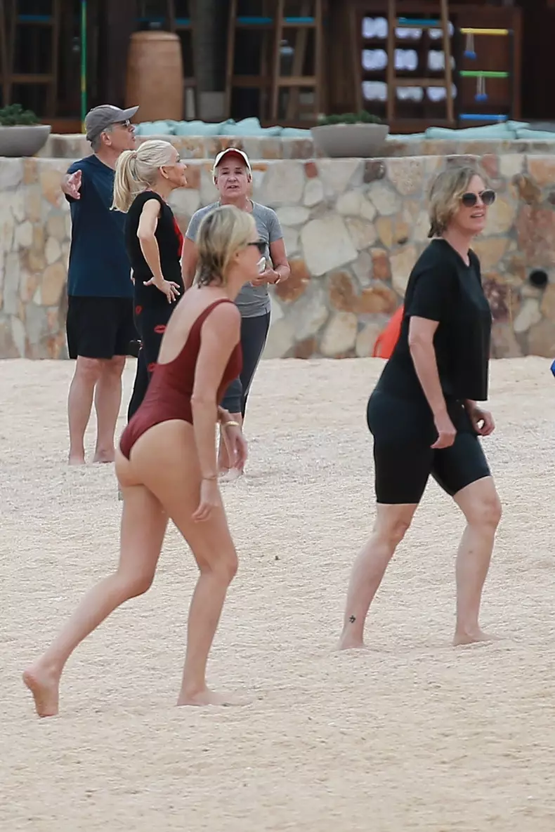 *PREMIUM-EXCLUSIVE* Charlize Theron sets pulses racing in a red hot one-piece bathing suit *WEB EMBARGO UNTIL DECEMBER 1, 2021 6:15 PM ET*