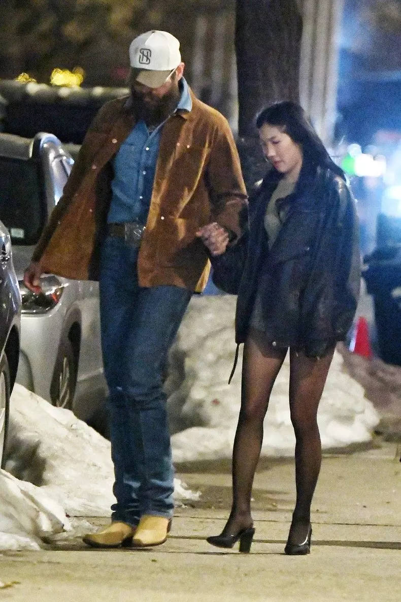 Post Malone and Christy Lee hold hands while enjoying a shopping trip in New York