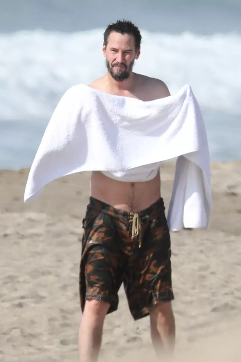 *EXCLUSIVE* Keanu Reeves shows off his very fit bod at 56 as he goes for a swim in Malibu **WEB EMBARGO UNTIL 12:15 PST on January 6, 2021**