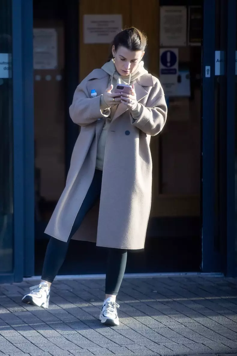 EXCLUSIVE: Coleen Rooney Is Seen Busy With Her Phone While Leaving A Gym