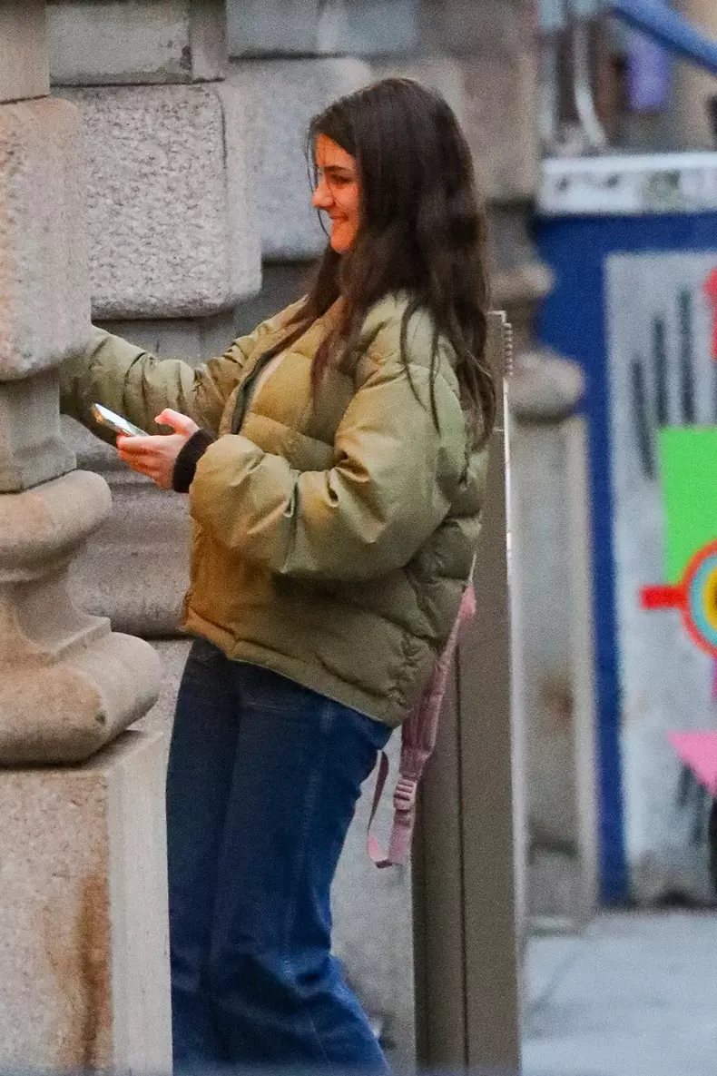 EXCLUSIVE: Suri Cruise Is All Smiles While Arriving Back Home In New York City