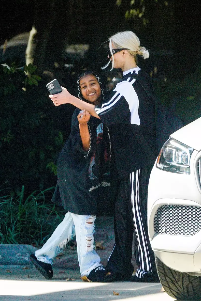 *EXCLUSIVE* Kim Kardashian and North West fool around for the shutterbugs after an art class