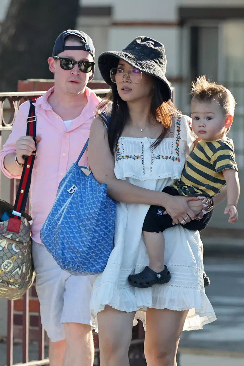 Former child superstar Macaulay Culkin is one proud papa as he enjoys a family day out with fiancŽe Brenda Song and their young son Dakota, 16 months, on a sunny afternoon in the LA suburbs.