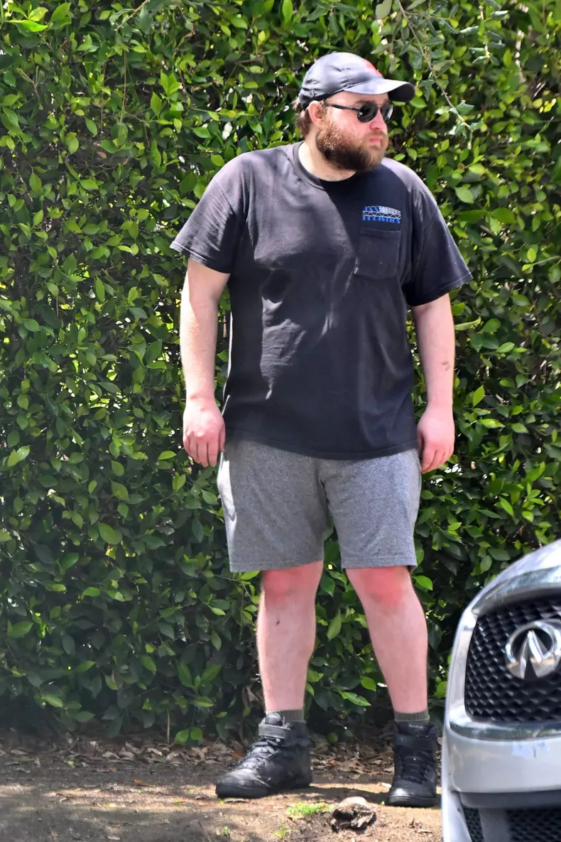 EXCLUSIVE: Two and a half Men star Angus T Jones has two trucks full of 'junk' hauled away from his home in Los Angeles