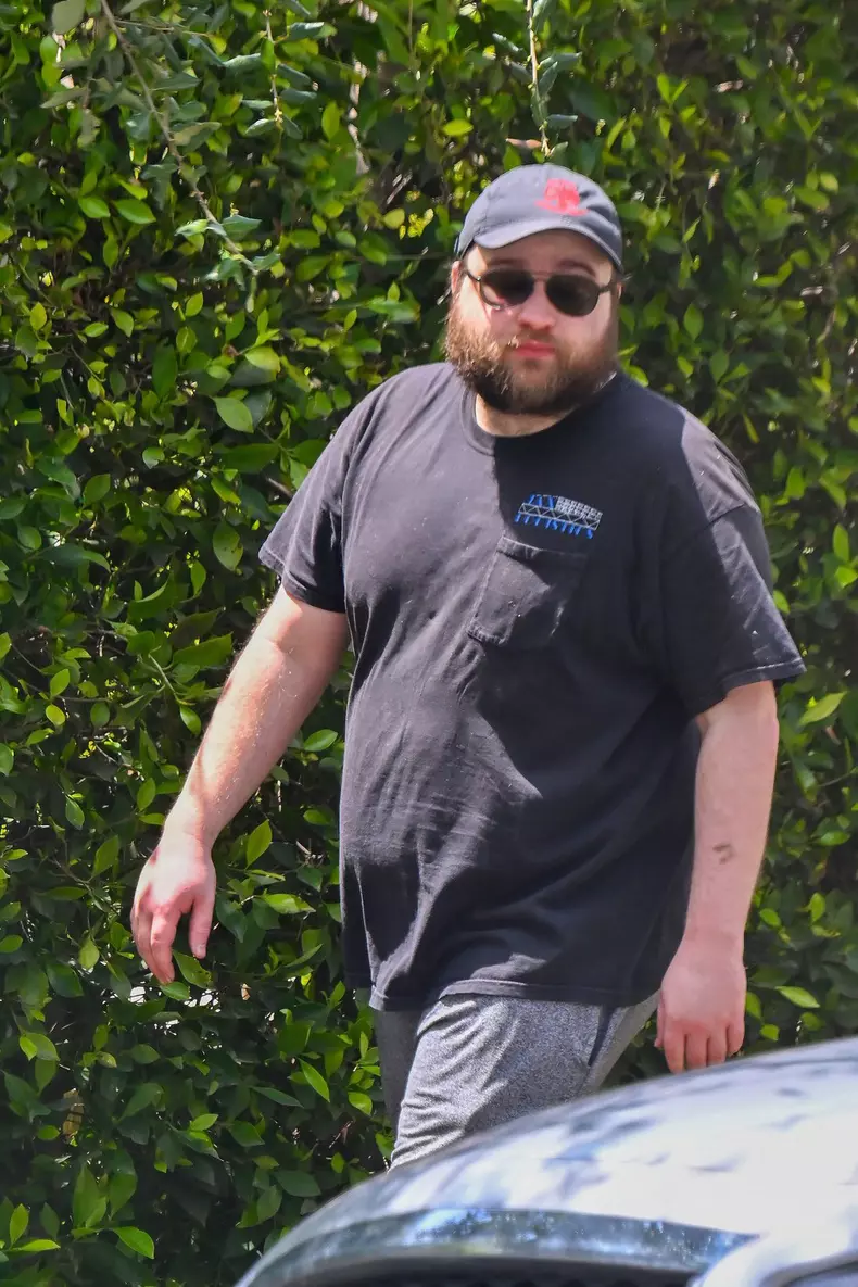 EXCLUSIVE: Two and a half Men star Angus T Jones has two trucks full of 'junk' hauled away from his home in Los Angeles