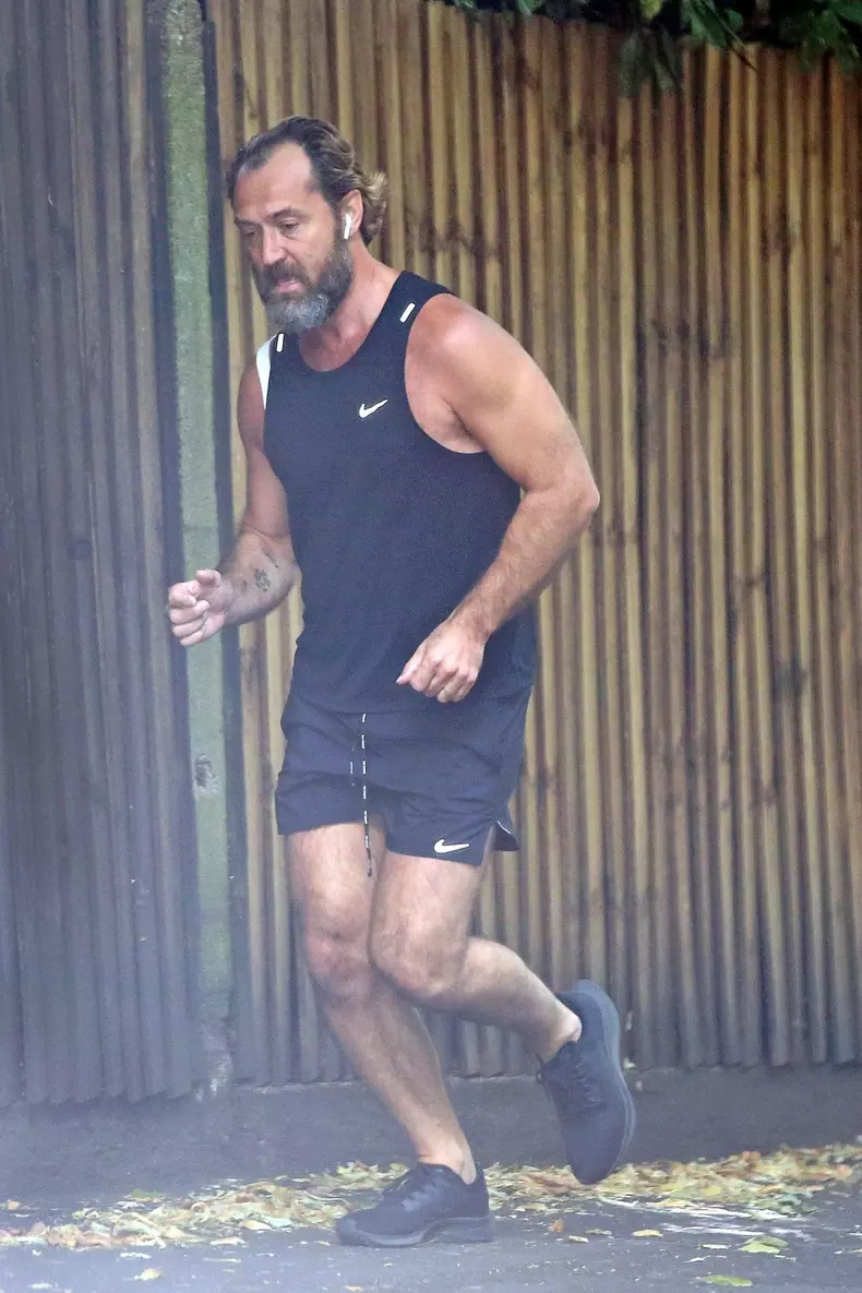 EXCLUSIVE: Jude Law goes for a jog a week after being pictured with wife Phillipa Coan without her baby bump