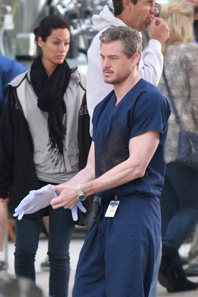Eric Dane takes off his gloves after filming an emotionally charged scene with co-star Chlyer Leigh in Downtown LA