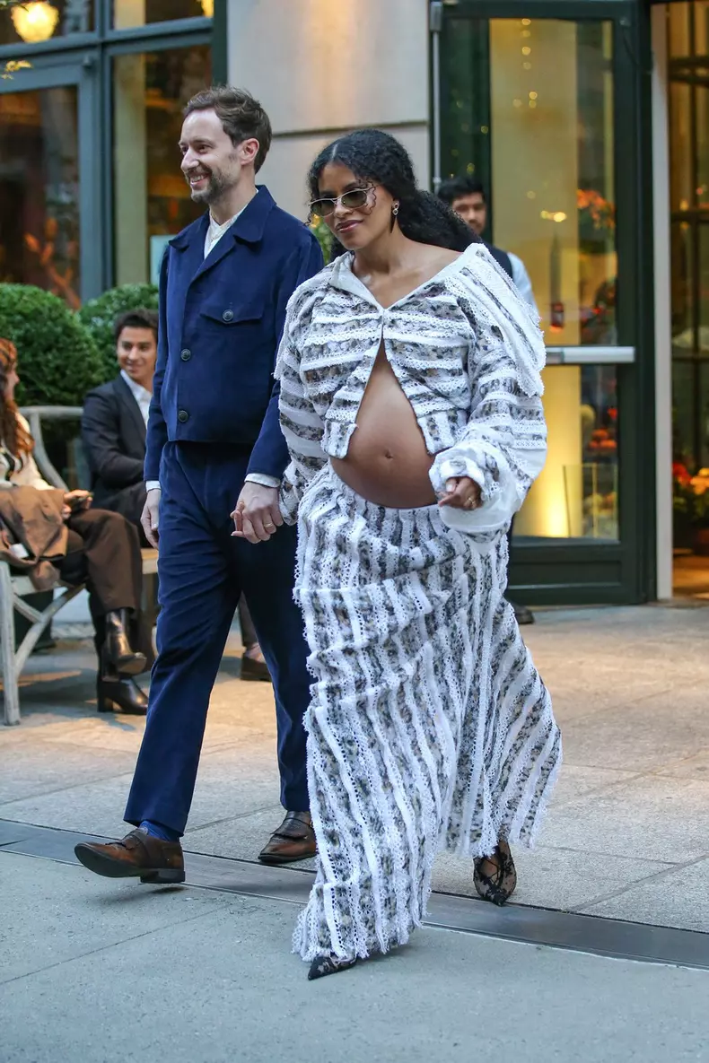 Zazie Beetz shows off baby bump while holding hands with David Rysdahl in NYC