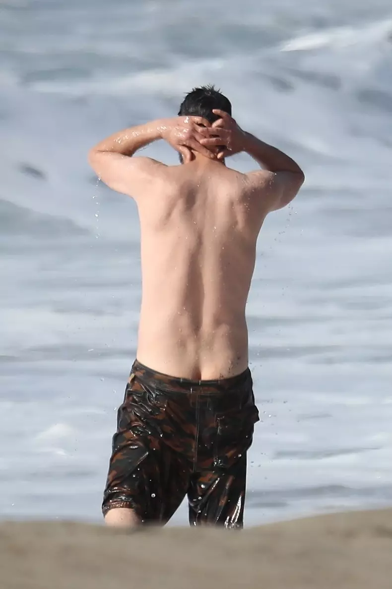 *EXCLUSIVE* Keanu Reeves shows off his very fit bod at 56 as he goes for a swim in Malibu **WEB EMBARGO UNTIL 12:15 PST on January 6, 2021**