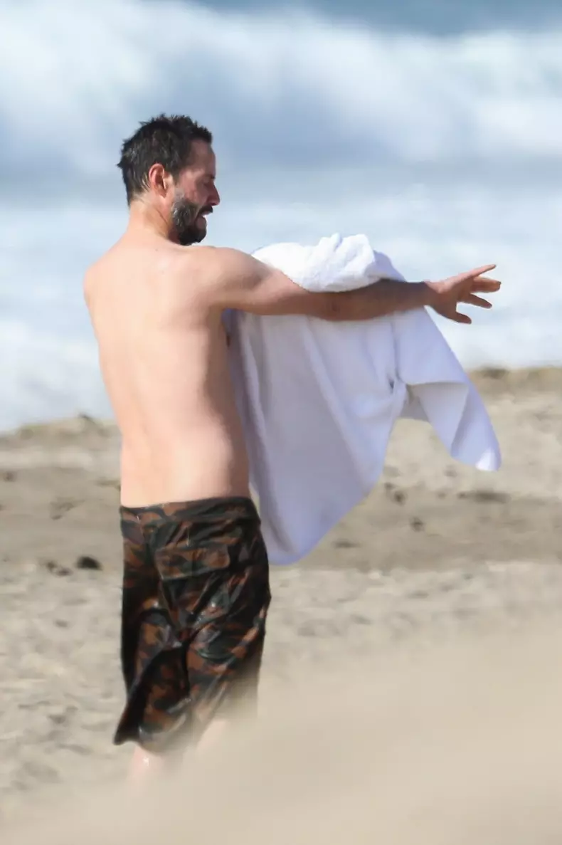 *EXCLUSIVE* Keanu Reeves shows off his very fit bod at 56 as he goes for a swim in Malibu **WEB EMBARGO UNTIL 12:15 PST on January 6, 2021**
