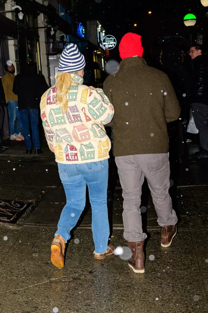 Amy Schumer and Chris Fischer leave after the Paul McCartney concert in New York