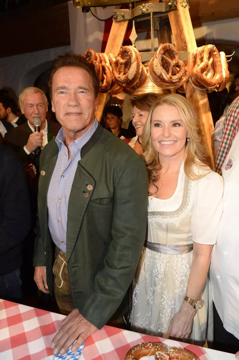Arnold Schwarzenegger and Heather Milligan attend the 27. Weisswurstparty in Going, Austria