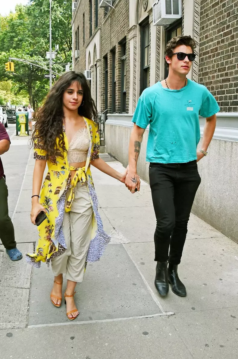 Shawn Mendes and Camila Cabello hold hands as they arrive to his apartment in West Village