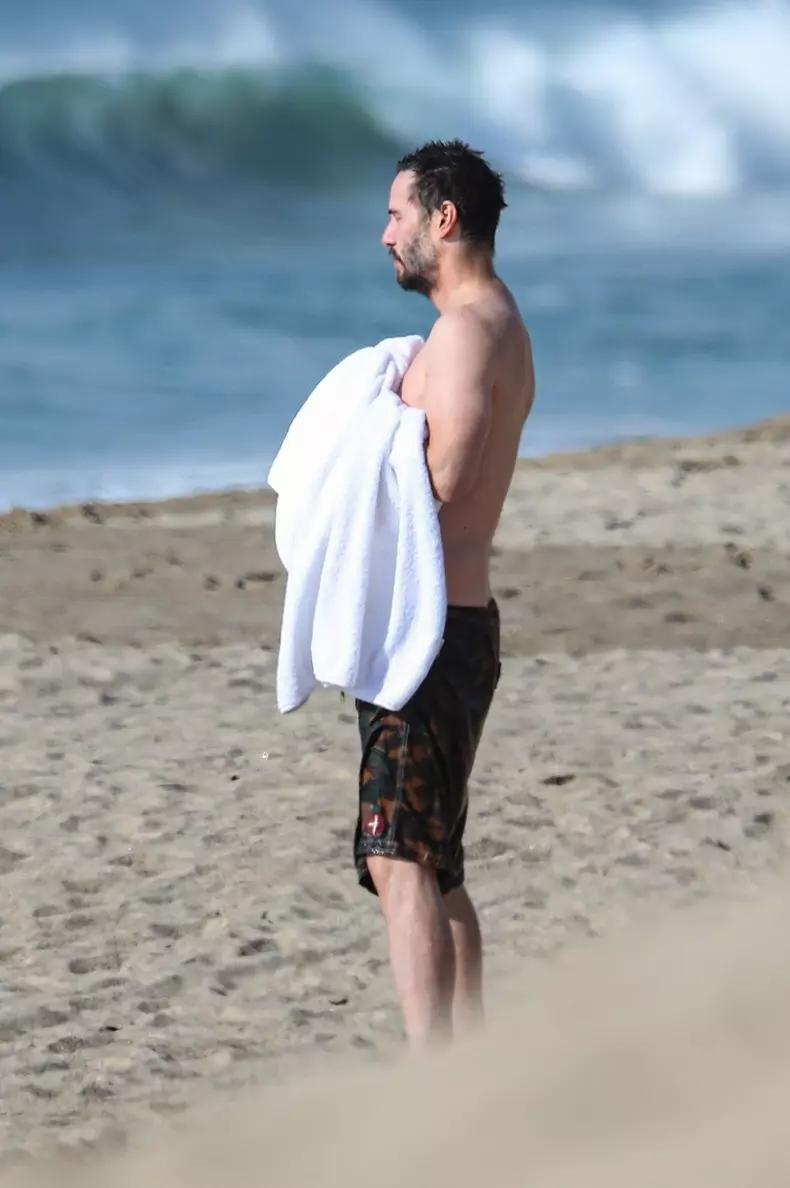 *EXCLUSIVE* Keanu Reeves shows off his very fit bod at 56 as he goes for a swim in Malibu **WEB EMBARGO UNTIL 12:15 PST on January 6, 2021**