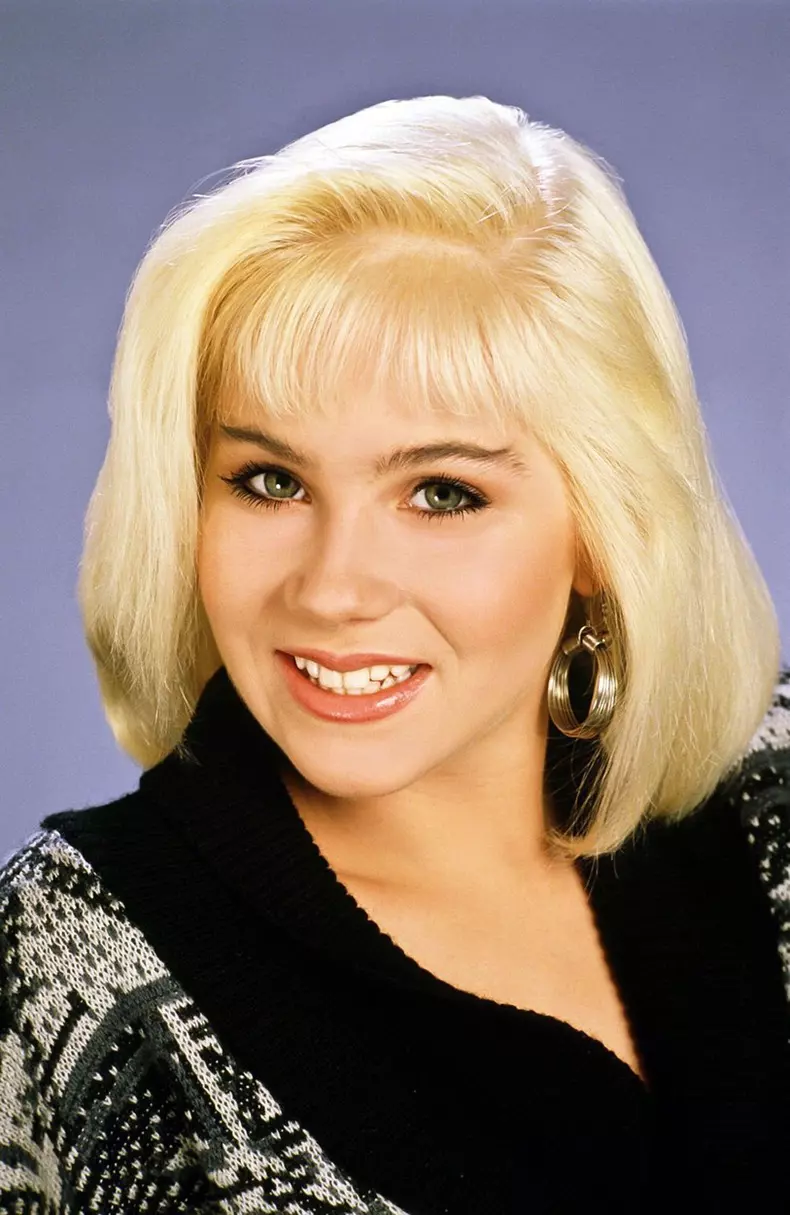 LIBRARY. USA. Christina Applegate  in the ©Fox Network TV series: Married with Children (1987-1997) . Plot: Al Bundy is a misanthropic women's shoe salesman with a miserable life. He hates his job, his wife is lazy, his son is dysfunctional (especially