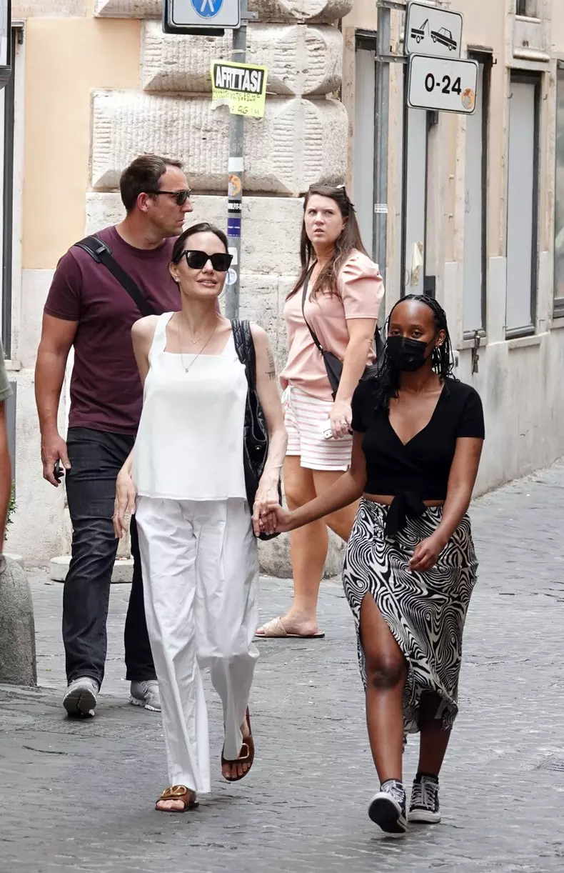 *EXCLUSIVE* WEB MUST CALL FOR PRICING  - American actress Angelina Jolie looks in great spirits as she treats her daughter Zahara to some shopping at Zara in Rome.