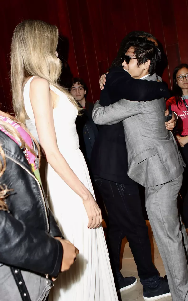 Angelina Jolie with British rapper Akala hugging her son Pax, New York
