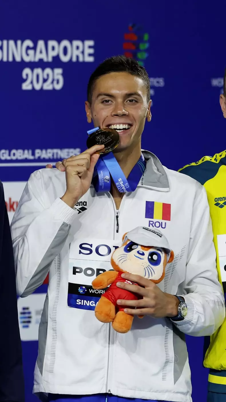 David Popovici după ce a luat aurul la proba de 100 de metri liber la Singapore 2025